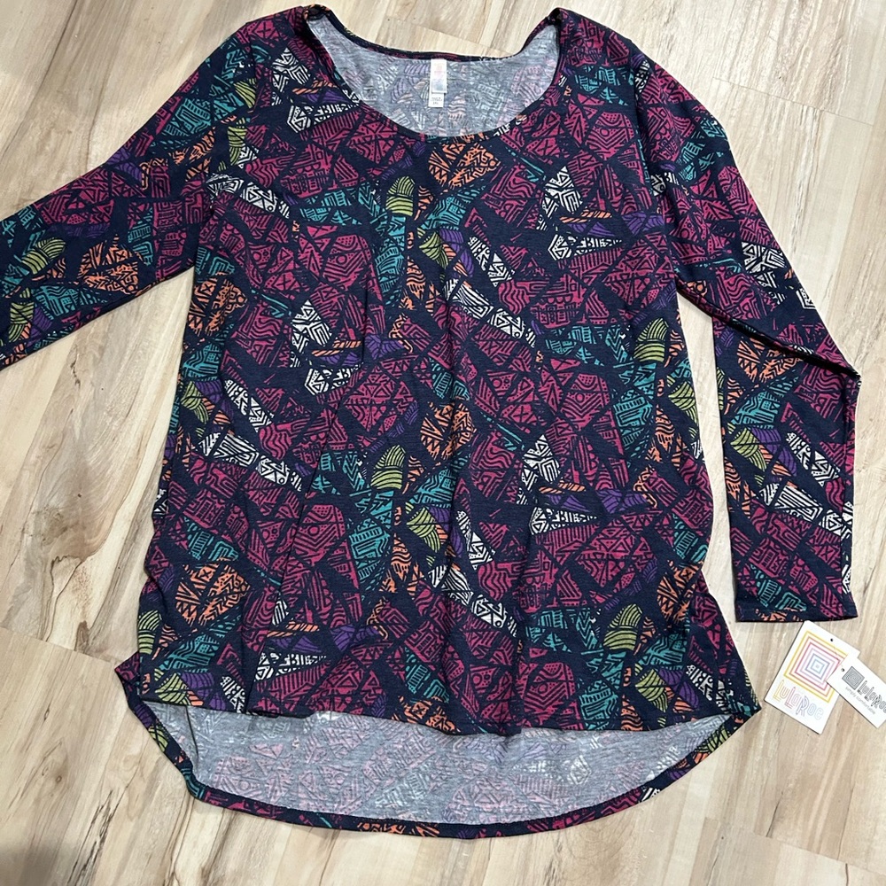 LuLa Roe long sleeve soft top made in Guatemala